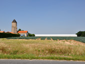 Vue sur l'ancien moulin du Bois Joly et une parcelle marachre